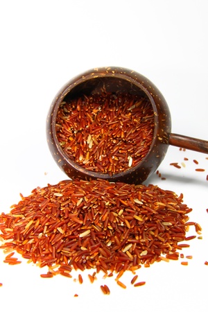 red jasmine rice and beaker on a white backgroundの写真素材