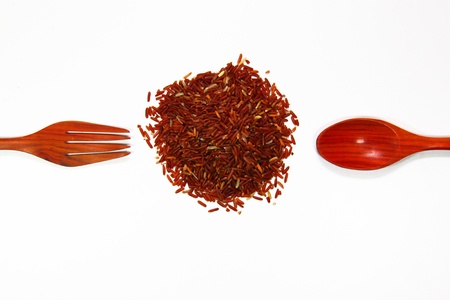 rice and spoon on a white backgroundの写真素材