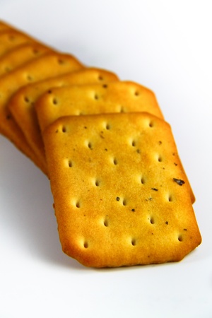 Row of crackers isolated on a white backgroundの写真素材