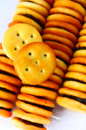 sandwich biscuits with grapesの写真素材
