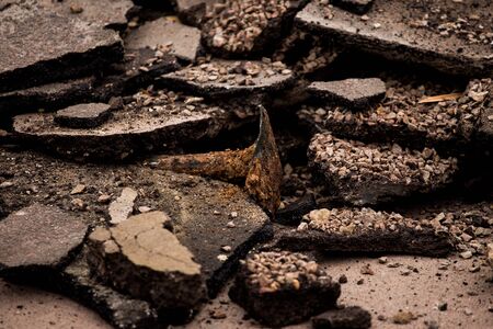 old broken asphalt in the city. road. earthquake, quake, temblor.の写真素材