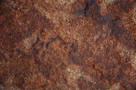 Rusty metal wall, old sheet of iron covered with rust with paint background texture.