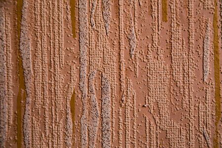 Close Up of texture orange color wallpaper background.の写真素材