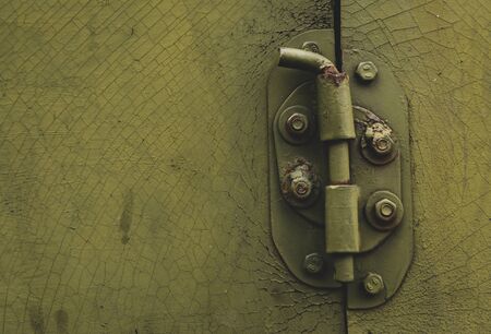 Metal door with bolt in grungy style with copy-space.の写真素材