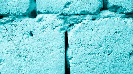 old blue brick wall texture background close up. wallpaper for your device.の写真素材