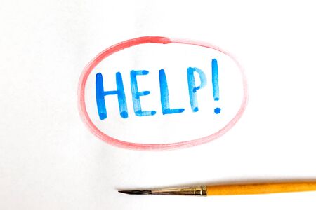 Handwritten HELP text with brush and watercolor paints on white background. Handwritten colors letters wordの写真素材