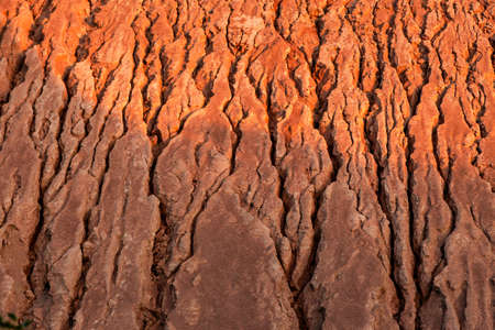 Red Rough Geological Formation Detail. Natural canyon backgrounds and texturesの写真素材