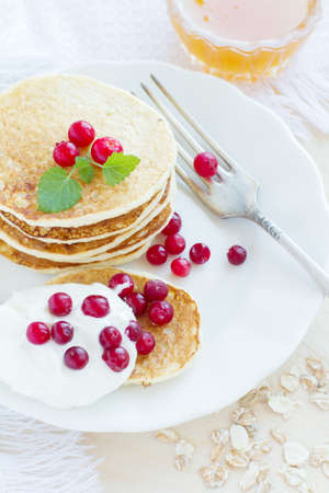 Pile of pancakes with berries