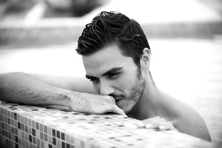 Man relaxing in a pool