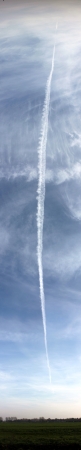 aircraft trail in the skyの写真素材