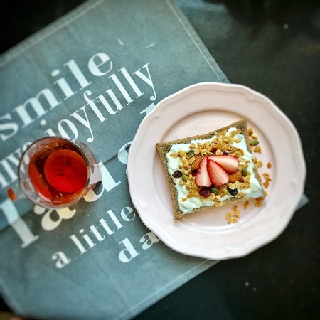 Nutritious and delicious breakfast, with toast strawberry wine and toastの写真素材