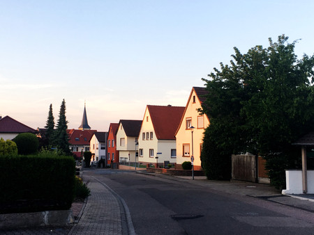 a typical town in Germany, with traditional house in a sunset sceneの写真素材