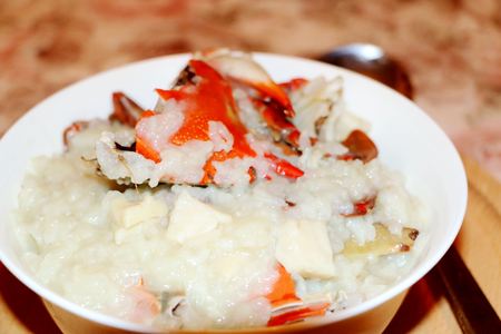delicious asian style crab rice with vegetablesの写真素材