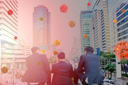the business men sitting on floor looking to the city scape with illustration of corona virus outbreak in environment. after virus outbreak many business stop ,closed,shutdown or work at home  what will happen is economic crisisの写真素材