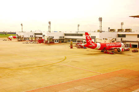 BANGKOK,THAILAND-5 SEPTEMBER;2019; airplane dock to a disembarktion at DON MUANG INTERNATIONAL AIRPORTのeditorial素材