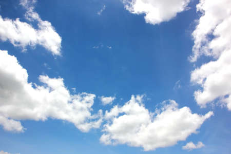 the abstract white cloud shape with blue sky backgroundの写真素材