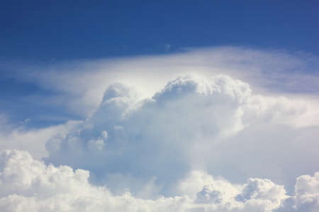 the abstract white cloud shape with blue sky backgroundの写真素材