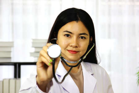 female doctor working with sethoscope