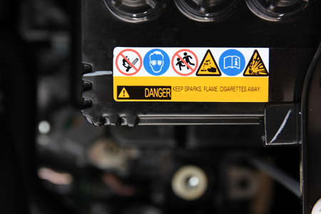 general warning sign to protect accident when some one work near the batteryの写真素材