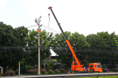 BANGKOK,THAILAND- 16 OCTOBER;2019:Electrical engineers and employees are moving and installing....