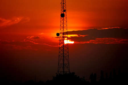 the telacommunication pole or mobile pole with sun set sky background