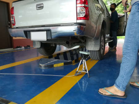 pick up one ton truck measuring the noise with sound level meter in garageの写真素材