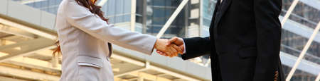 business woman hand shake with business man congratulation together dealing contract join team work growth planの写真素材