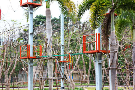 ropes balance station in amusement park. the game for trainning body balance on ropes and funny