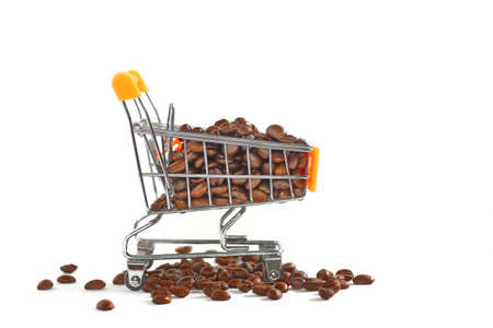 roasted coffee beans in small shopping cart  isolate on white backgroundの写真素材