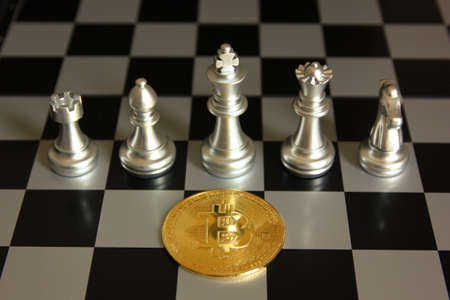 bitcoin with chess pieces on chess board  , bitcoin strategy tread conceptの写真素材
