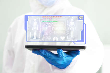 doctor in safety suit holding tablet electronic medical record digital health icon , technology...