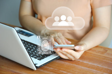 Asian woman using mobile phone verifying identity scan finger print sign in cloud personal daa...