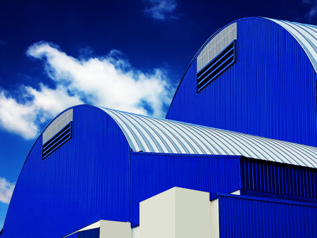 warehouse exterior design using curve roof to add copy space .abstract geometric pattern on blue wall minimal styleの写真素材