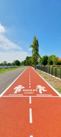running track,  exercising outdoors by running every day helps keep  everyone healthy