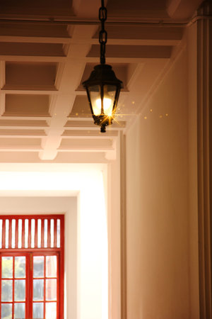 vintage lantern shining brightly install on retro ceiling square design perspective view