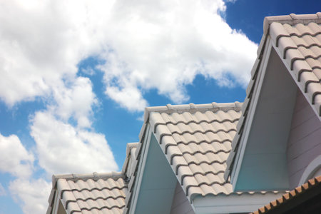 roof triangle shape design roof tile seamless on blue skyの写真素材