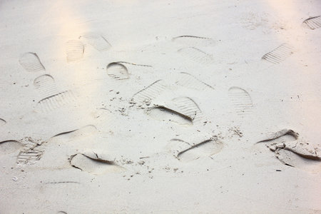 unknown owner many footprints on beach