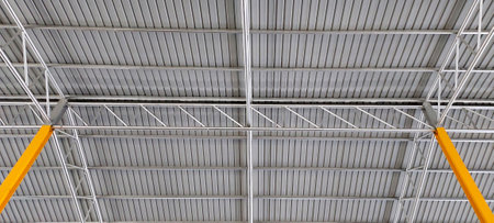 corrugated metal roof tiles roof beam steel structure geometric pattern abstract background , architect design conceptの写真素材
