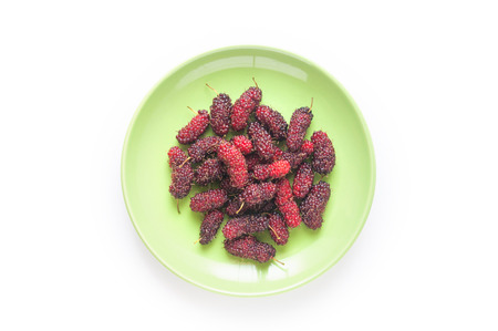 Organic Mulberry in Green Dish on White Background