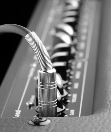 Close up of jack cable with guitar amplifier
の写真素材