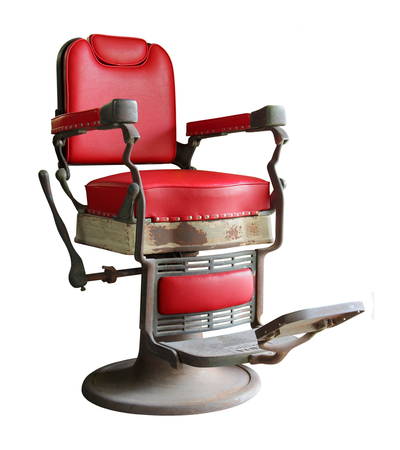 old barber chair isolated on white backgroundの写真素材