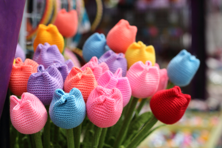 colorful fabric tulips in vase at souvenir shopの写真素材