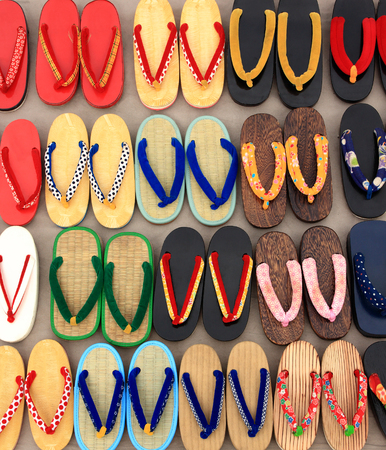 secondhand sandals for sale at street market in Thailandの写真素材