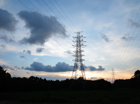 electric tower in sunset backgroundの写真素材