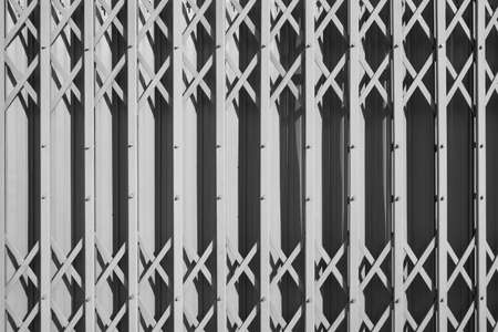 pattern of iron door with light and shadow, background for text or image