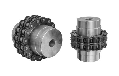 Chain gear is driven by an electric motor for industrial use on white backgroundの写真素材