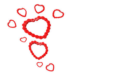 The Red heart-shaped iron chains of various sizes on a white background.の写真素材