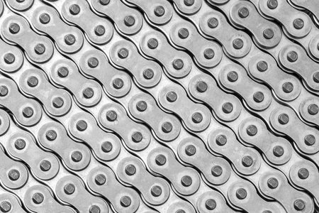 Industrial Chain a close-up shot in black and white, is used as a background.の写真素材