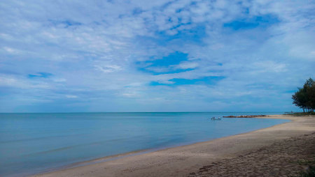 Beautiful view of the sea contrasting with the sky, along the coast of Ranot District, Songkhla, Thailand.の写真素材