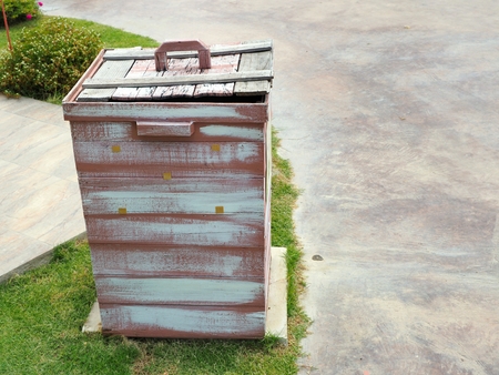 Wooden slatted litter bin.の写真素材